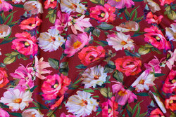 Dark red viscose-jersey with roses
