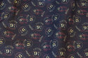 Medium-thick cotton in black with Harry Potter 9-3-4 motif