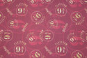 Medium-thick cotton in wine-red with Harry Potter 9-3-4 motif