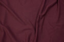 Organic, light sweatshirt fabric in dust-eggplant-colored with softened back