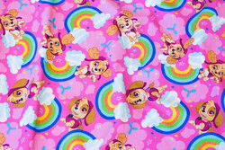 Pink cotton-jersey with ca. 5 cm paw patrol motifs and rainbows