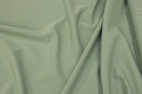 Two-way stretch in light almond-green