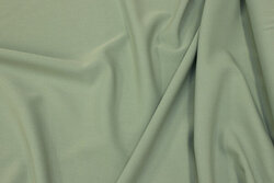 Two-way stretch in light almond-green