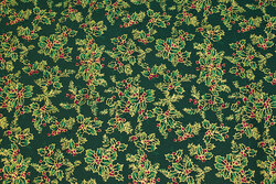 Dark green christmas-cotton with holly