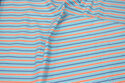 Length-striped cotton in turqoise, red, navy