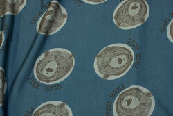 Softened, dove-blue sweatshirt fabric with bears