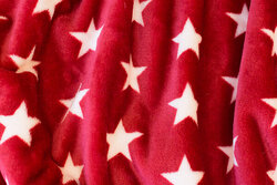 Supersoft micro-fleece in winter-red with ca. 5 cm stars