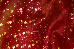 Wine-red, transparent organza with 1-1½ cm gold stars