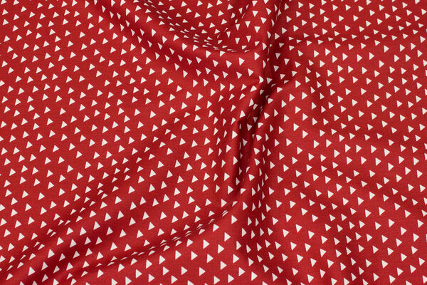 Winter-red cotton with ca. 1 cm white triangles